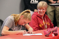 student signing national letter of intent