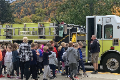 students exploring fire truck