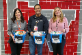 people holding donation gifts