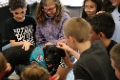 students petting dog