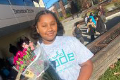 student wearing girls who code shirt