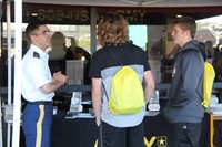 chenango valley high school students talk to military representative at college day