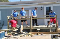 far shot of team working on deck