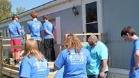 group working together on deck