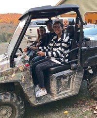 students and parent in a buggy