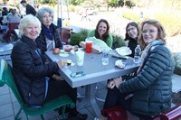 teachers smile while eating at binghamton university