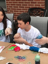 another male student tie dying shirt