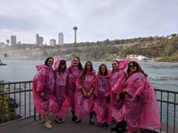 students in ponchos at niagra falls