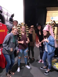 students in costume hats