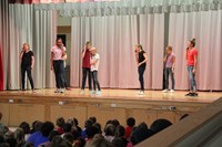 students on phone as part of play