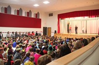 wide shot of students acting in play