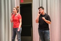 middle school students acting in play
