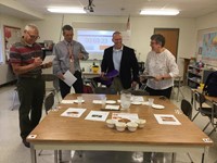 judges working on judging grilled cheese sandwiches