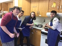 students with their grilled cheese sanwich in gourmet foods class