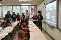 french students talk to elementary classroom