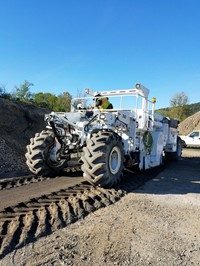 student using equipment at construction career day