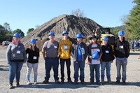 group shot of eight c v students at construction career day