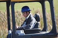 up close of c v student equipment to move mud at construction career day