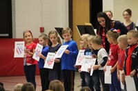 closer shot of students reading patriotic poem