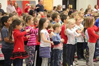 child signing and singing song