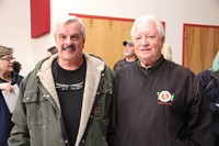 two veterans smiling at chenango bridge assembly