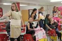 students at trashion show dressed up