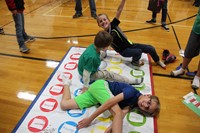 boys playing an educational twister game