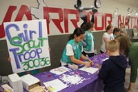 girl scout table at humanities night