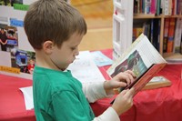 boy reading a book