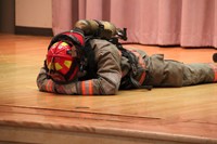firefighter demonstration laying on floor