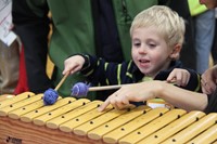 student playing instrument at humanities night