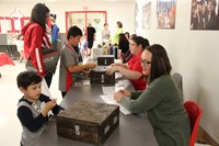 students at puzzle table at humanities night