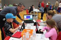 students playing history trivia game at humanities night