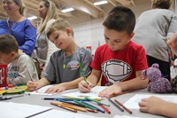 two boys coloring