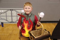 student dressed as a campfire