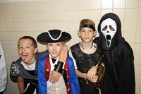 four male students dressed for halloween at chenango bridge elementary