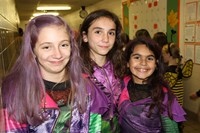 three girls dressed up for halloween event