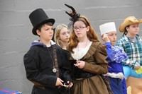 middle school students dressed in costumes