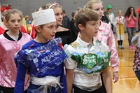 students dressed as water bottles for middle school costume contest