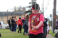 boy dressed as pirate for halloween parade