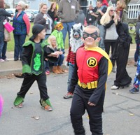 boy dressed as robin from batman