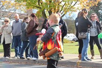 boy dressed as campfire with smore for halloween parade