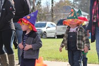 more students dressed in scarecrow hats