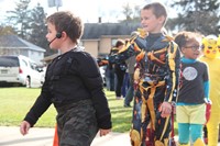 students dressed up for halloween parade