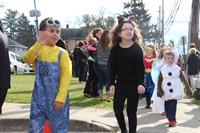 students dressed in costumes for parade