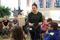 mrs truesdail walks around showing students stethescope