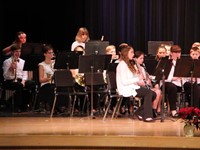 students from seventh and eighth grade band performing