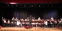 seventh and eighth grade band performing on stage