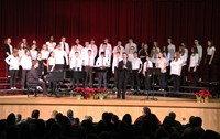 mister vanderslice speaking with students on stage