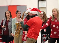 teacher playing saxophone